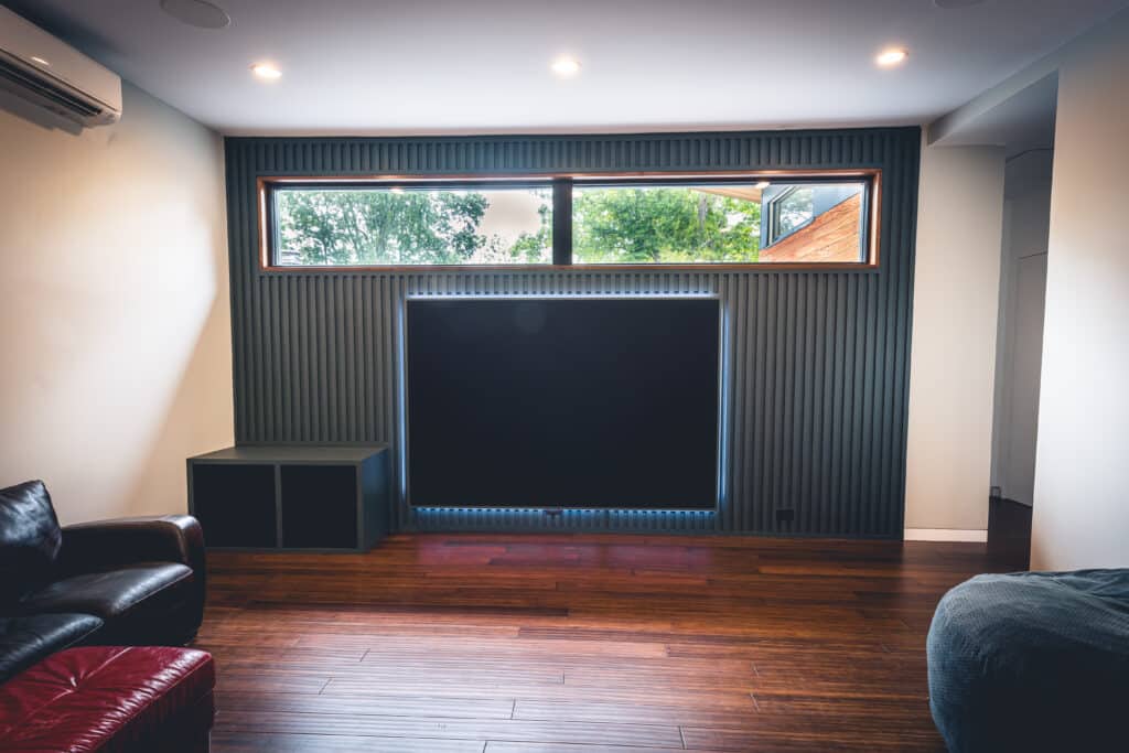 Custom Home Theater and Media Room installation in a modern home in Nashville, TN.  Focal Speakers, Slat Diffusers and LG OLED